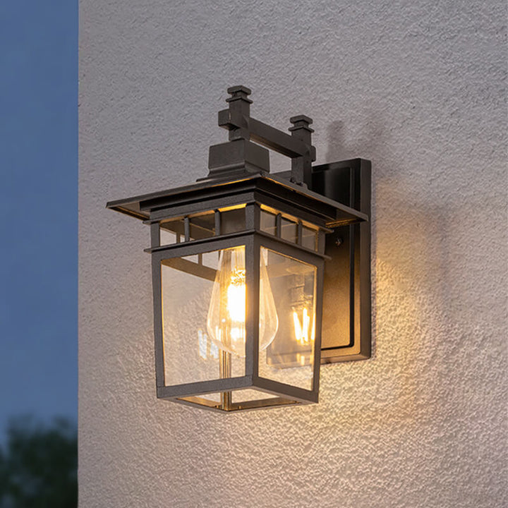 Close-up of exterior wall sconce and lantern lighting fixture