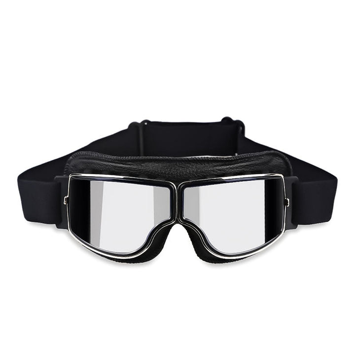 Riding goggles with reflective silver lenses and durable frame construction