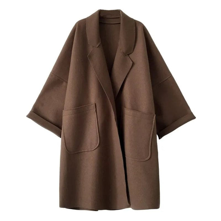 Detailed shot of the lapel and button closure on the stylish womens outerwear coat.
