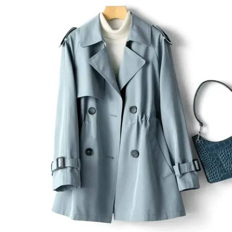 Pamela double-breasted trench coat back view, showing classic tailored fit and belt detail