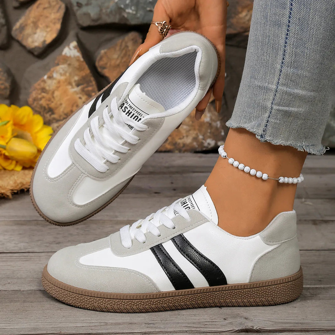 Back view of women casual footwear showing cushioned heel and sturdy sole