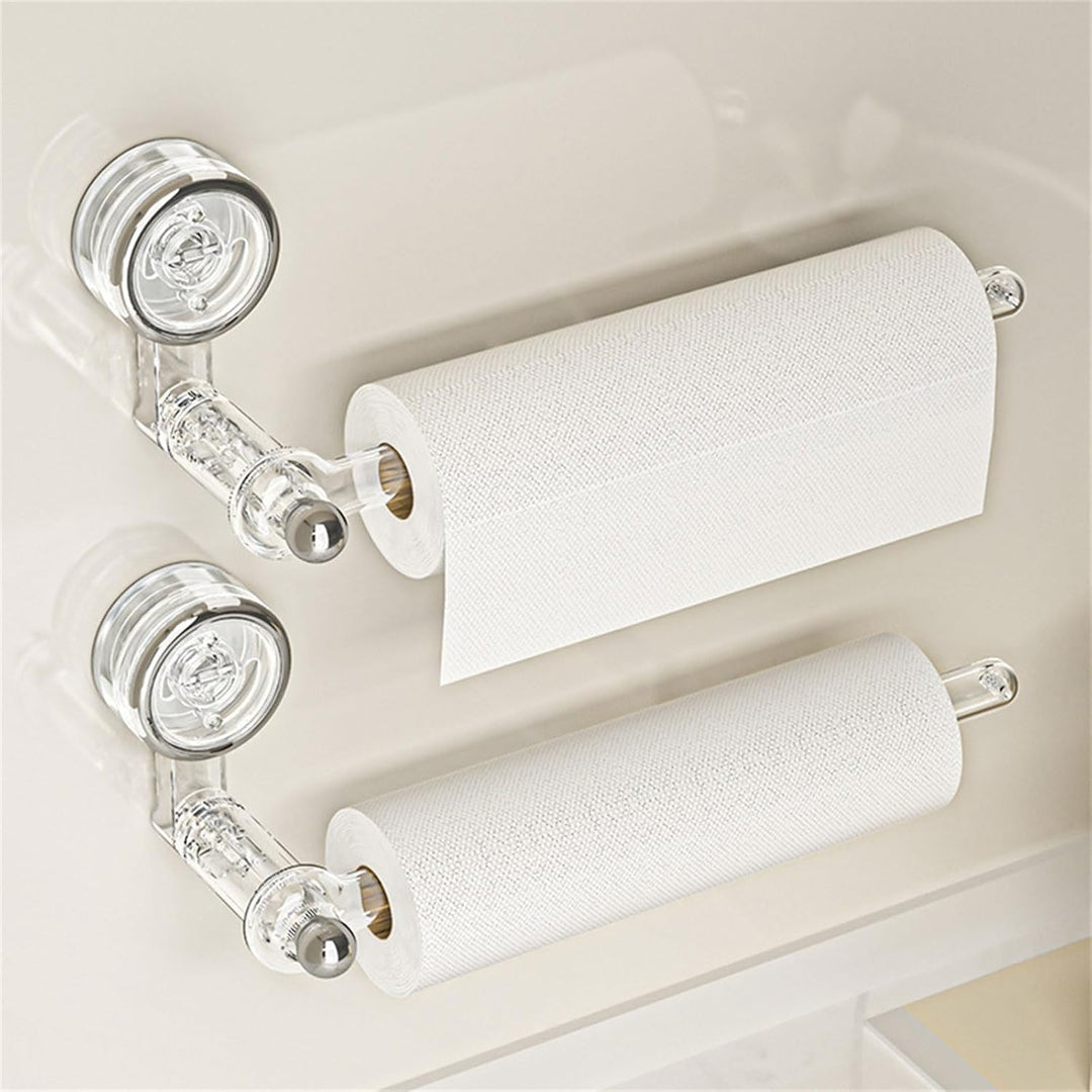 Wall mounted paper towel holder attached to a kitchen surface via suction cup holding paper towels
