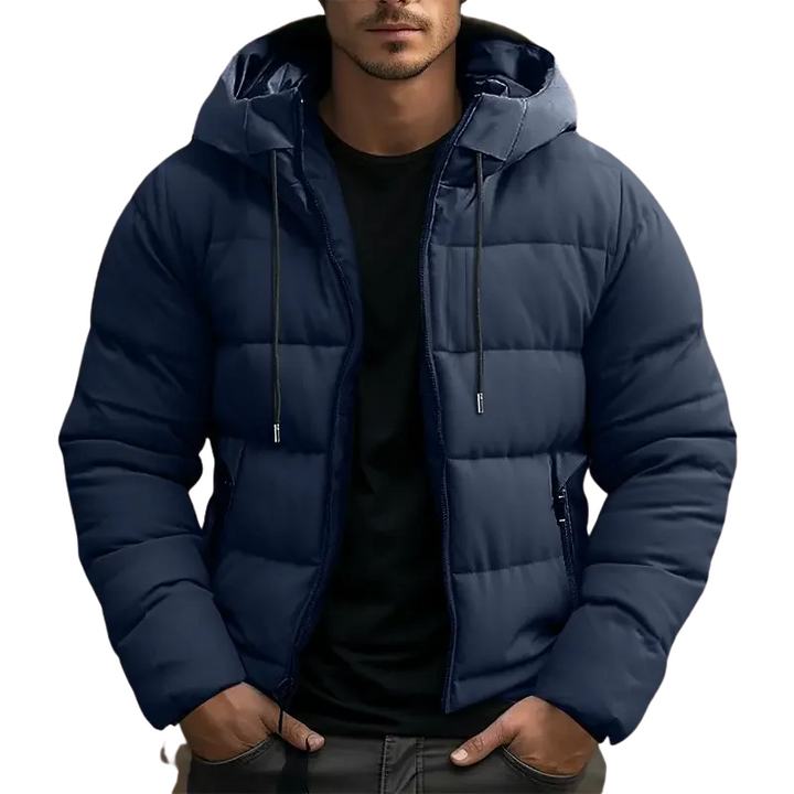 Man wearing a Navy Blue hooded quilted puffer jacket