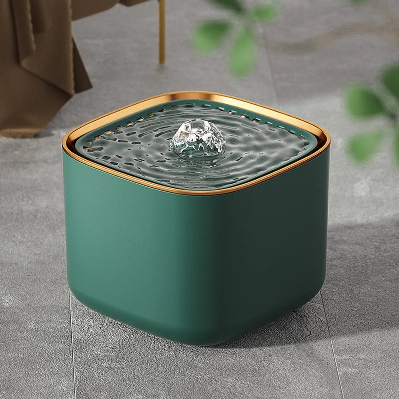 Green and gold pet water fountain in a modern room setting