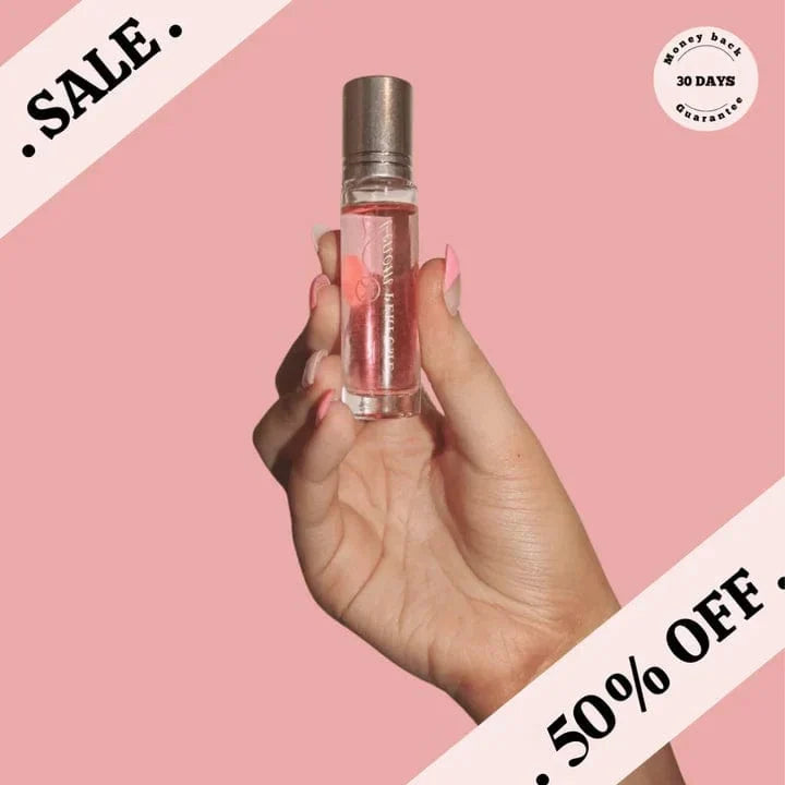 Beauty cosmetic fragrance with pheromones in a sleek travel bottle