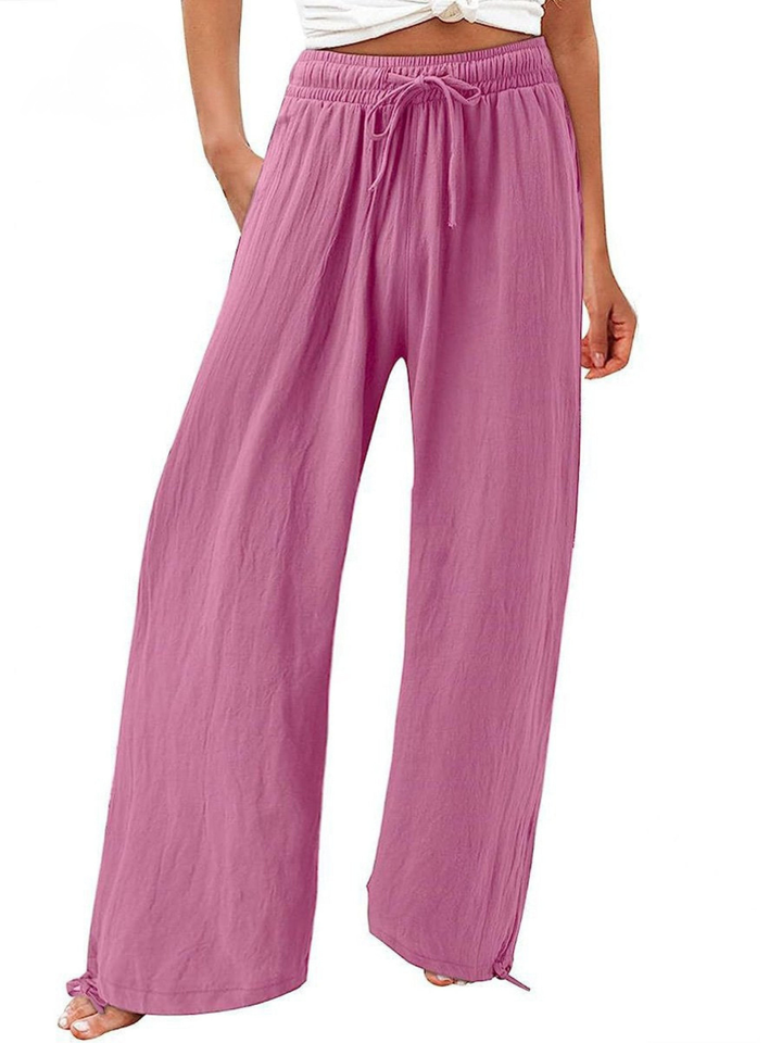 Relaxed fit linen trousers hanging to show wide leg silhouette