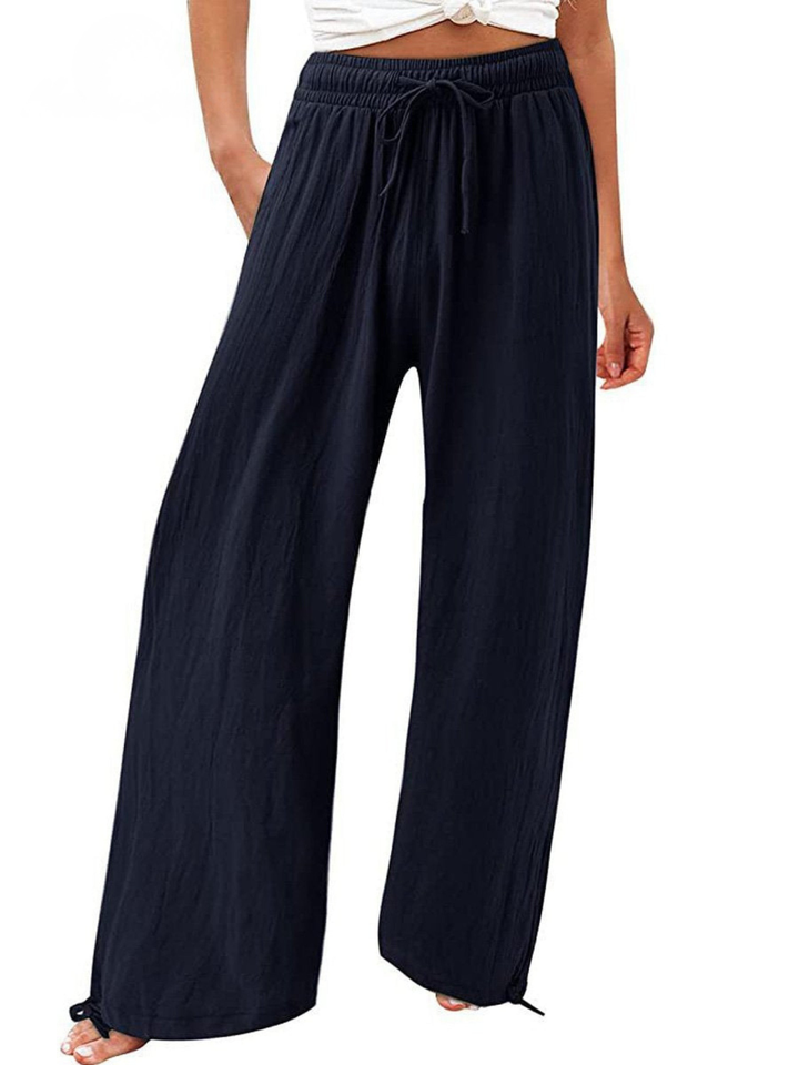 White boho pants featuring a comfortable drawstring waist