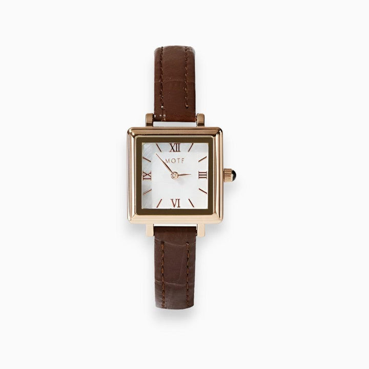 Close-up of the stylish square dial womens quartz watch showcasing wrist accessories.