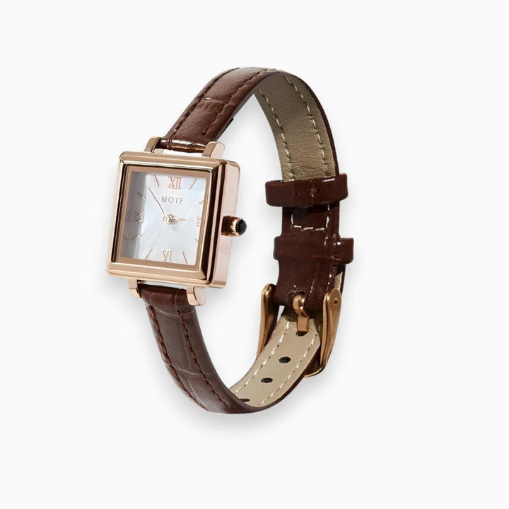 Women's elegant square quartz watch featuring a minimalist dial and sleek strap.