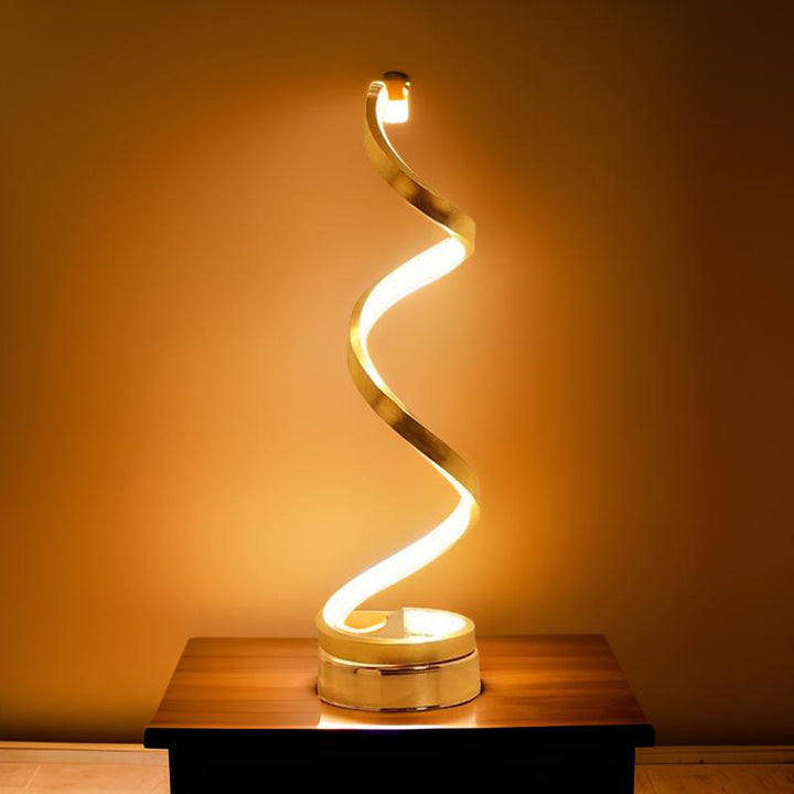 Contemporary touch control bedside lamp casting warm ambient lighting