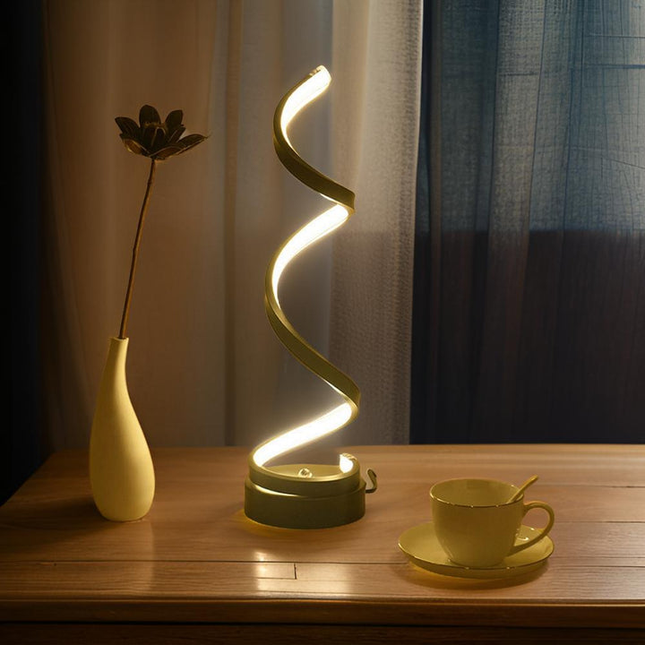 Modern LED spiral table lamp with sleek silver finish and touch control