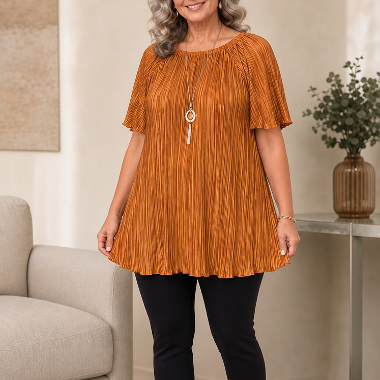 Burgundy pleated wide-fit blouse showing textured short sleeves and casual silhouette