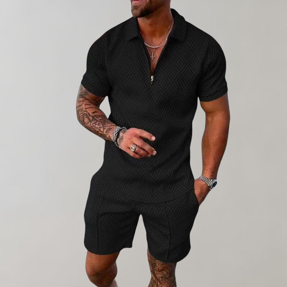 Man wearing black textured short-sleeve polo and matching shorts summer outfit