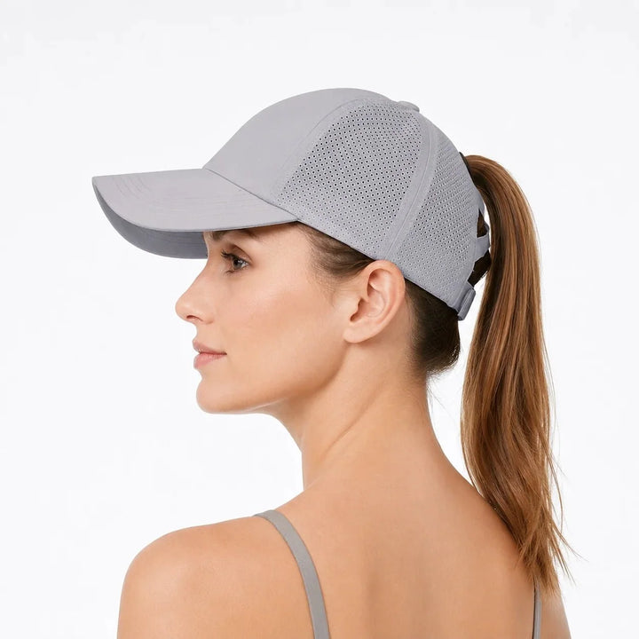 Running hat designed for women with a convenient ponytail opening and moisture-wicking fabric