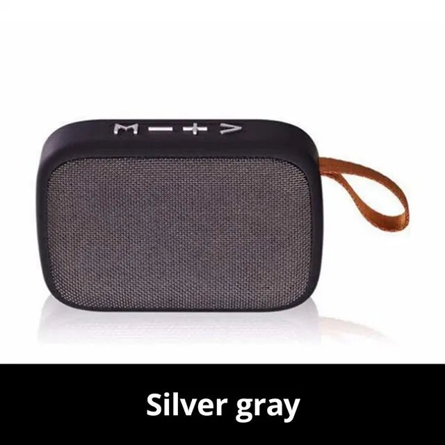 Portable wireless speaker emitting vibrant stereo sound in a living room setting