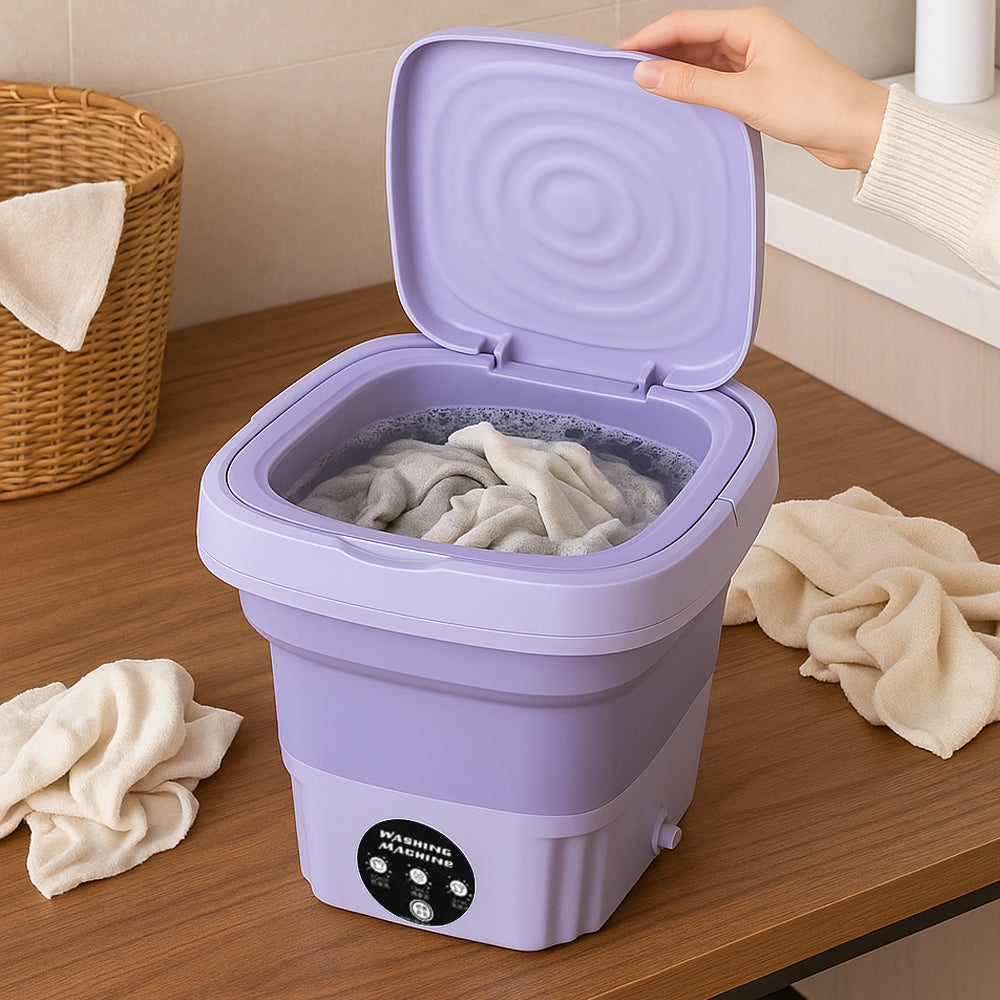 Open purple portable washing machine filled with water and laundry
