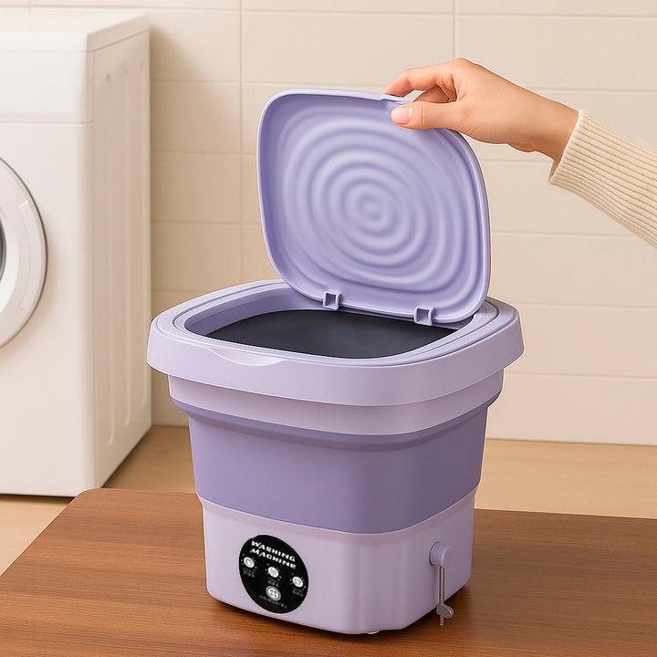 Portable purple travel laundry machine with spinning dryer basket