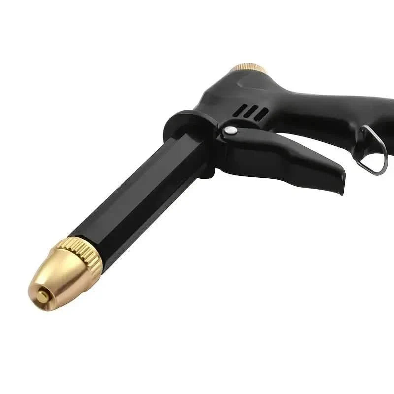 Close-up of the adjustable brass nozzle and trigger mechanism