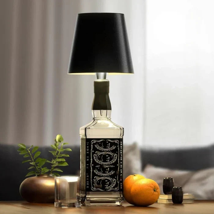 Portable LED bottle lamp for indoor and outdoor use on a dining table