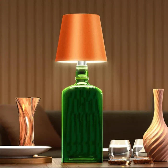 Rechargeable wireless lamp casting warm light on a modern patio setup