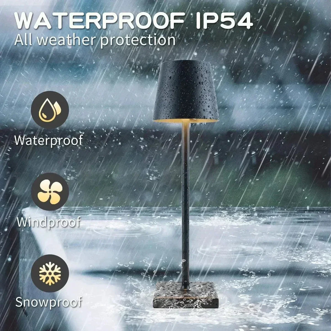 Dimmable table lamp angled to display its rechargeable battery base