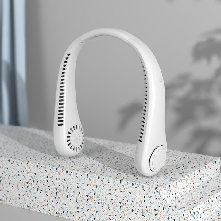 USB rechargeable fan shown with charging cable for travel convenience