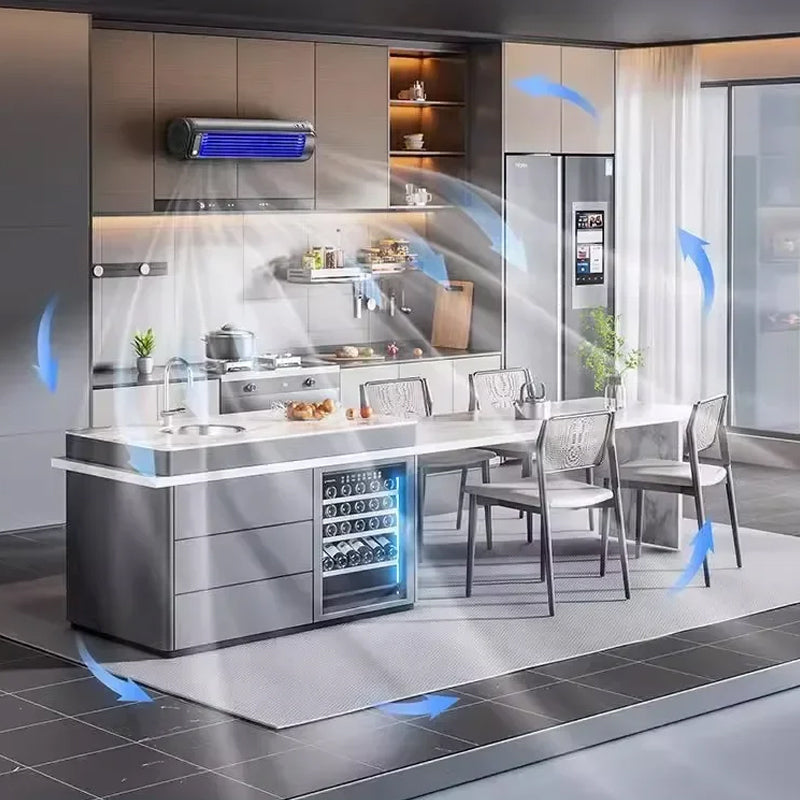 Portable tower fan mounted on a modern kitchen wall providing airflow
