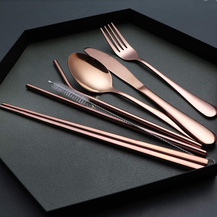 Travel cutlery set components neatly arranged on a flat surface