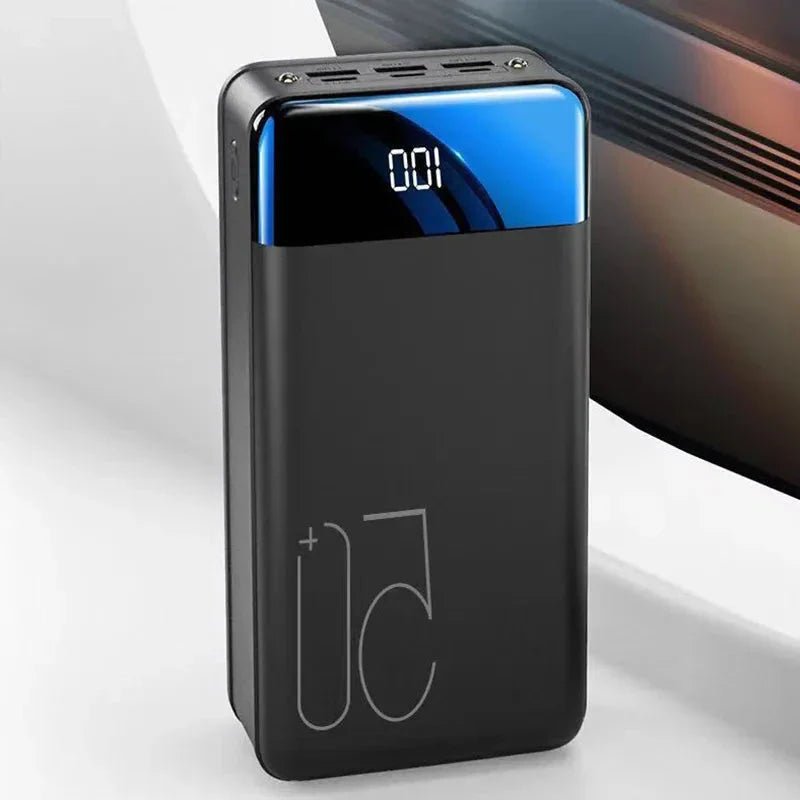 Universal 50000 mAh Power Bank standing vertically with digital LED display showing battery percentage