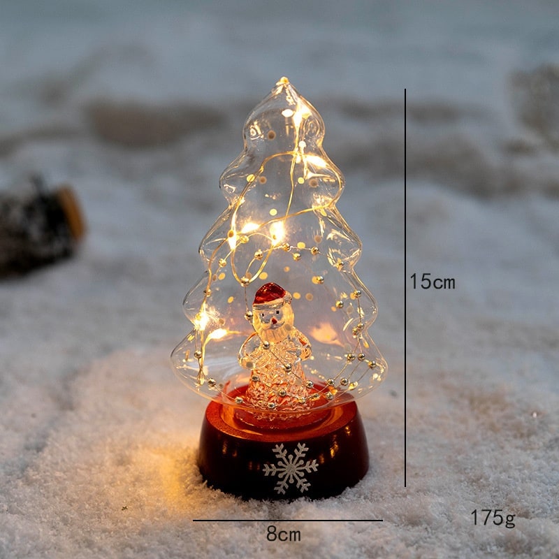 Pre-lit glass-look tabletop Christmas tree with Old Man figurine inside and height and weight measurements