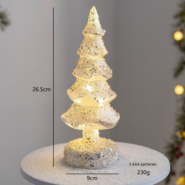 Sparkling pre-lit Christmas tree glowing as a cozy home accent