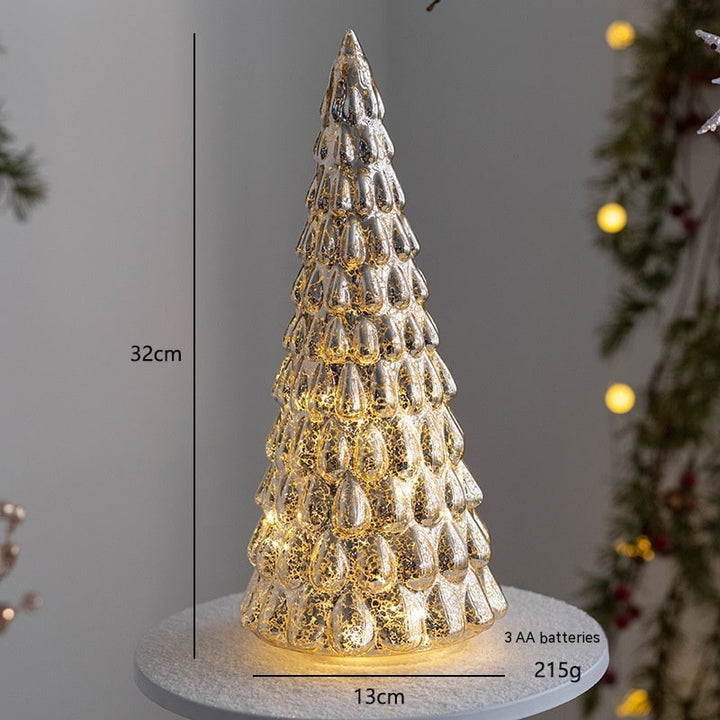 Modern tabletop Christmas decoration styled with glowing LED lights