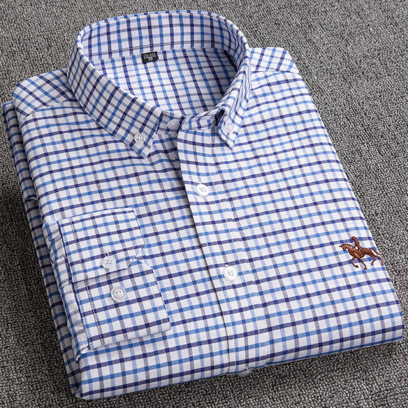Adjustable button cuffs on long sleeves of mens cotton shirt