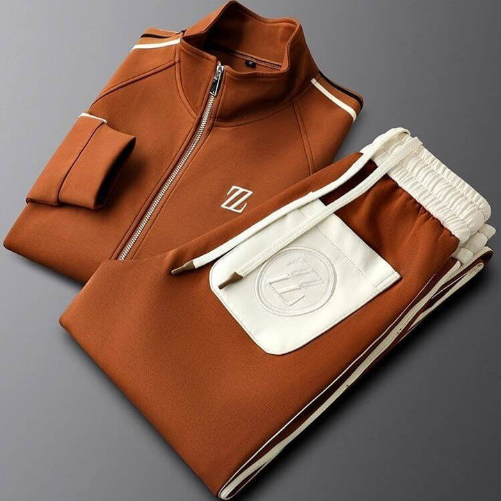 Chestnut brown men's premium tracksuit set featuring a zip jacket and matching trousers
