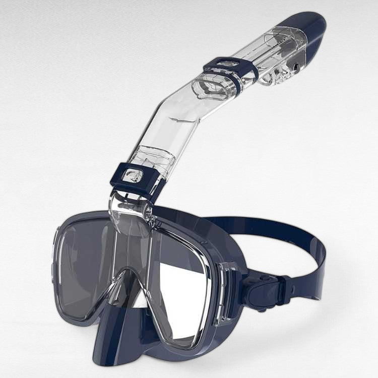 Water sports enthusiast wearing unisex snorkel mask exploring coral reef