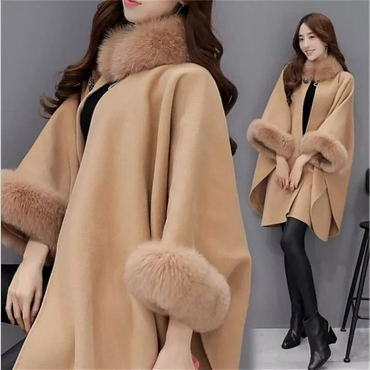Full view of beige winter cape coat with fur collar