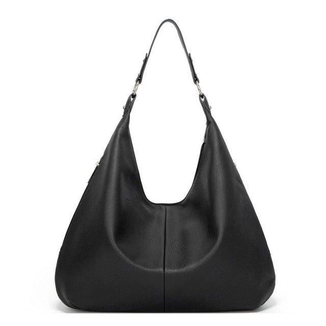 Luxury bag displayed with its adjustable and detachable crossbody strap