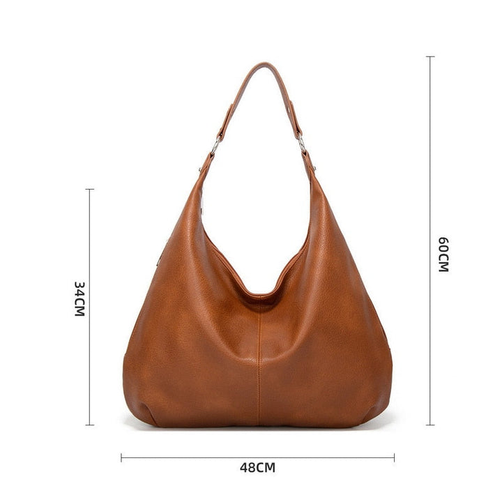 Stylish tote women bag featuring durable hardware and comfortable handles