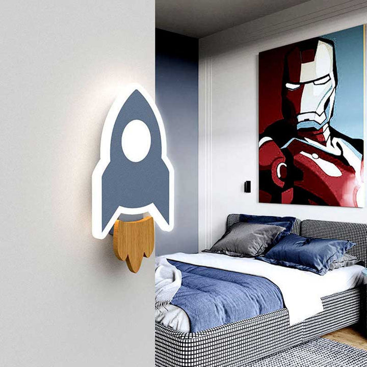Children's LED wall light lit up in a dark nursery, casting a soft glow