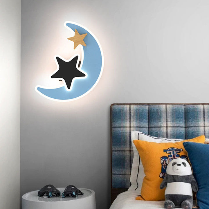 Blue moon and stars children LED wall light mounted in a nursery bedroom