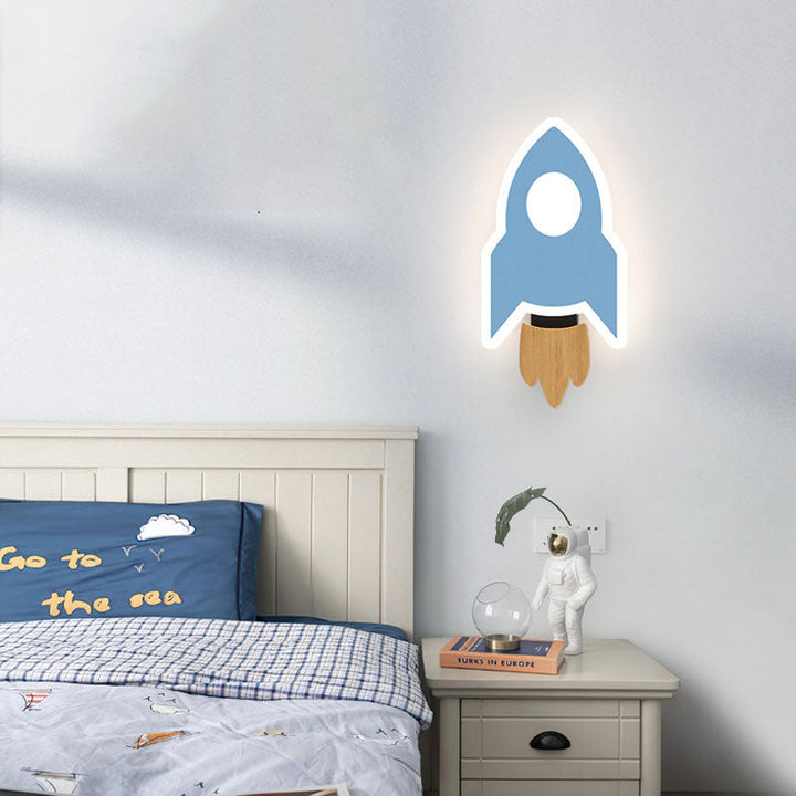 Nursery decor featuring the children room lighting mounted above a crib