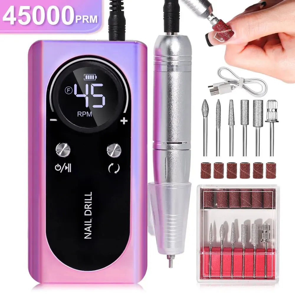 Close up of electric nail file handpiece with metal drill bit inserted