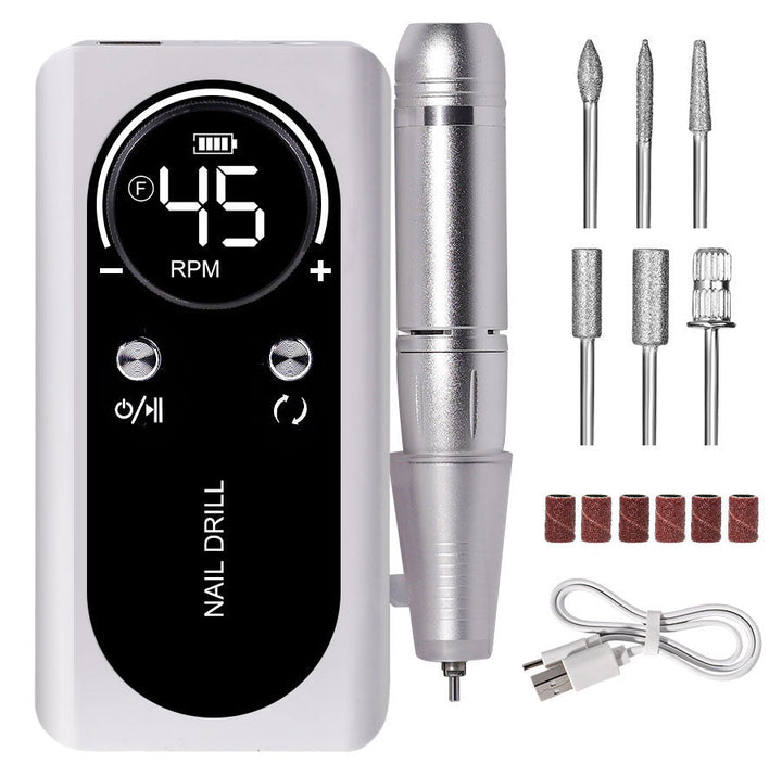 Portable rechargeable nail drill showing USB charging port and back clip