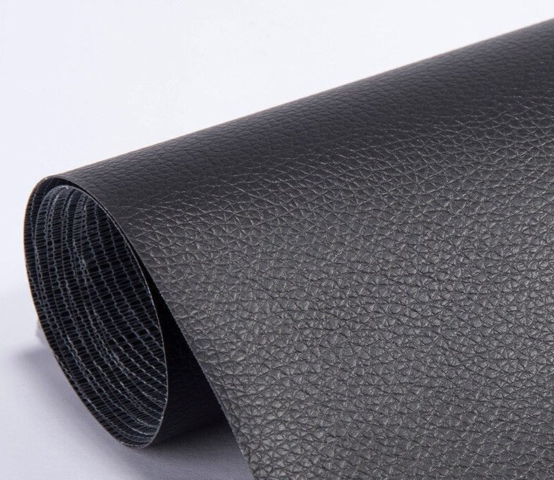 Black PU leather repair patch roll texture close-up