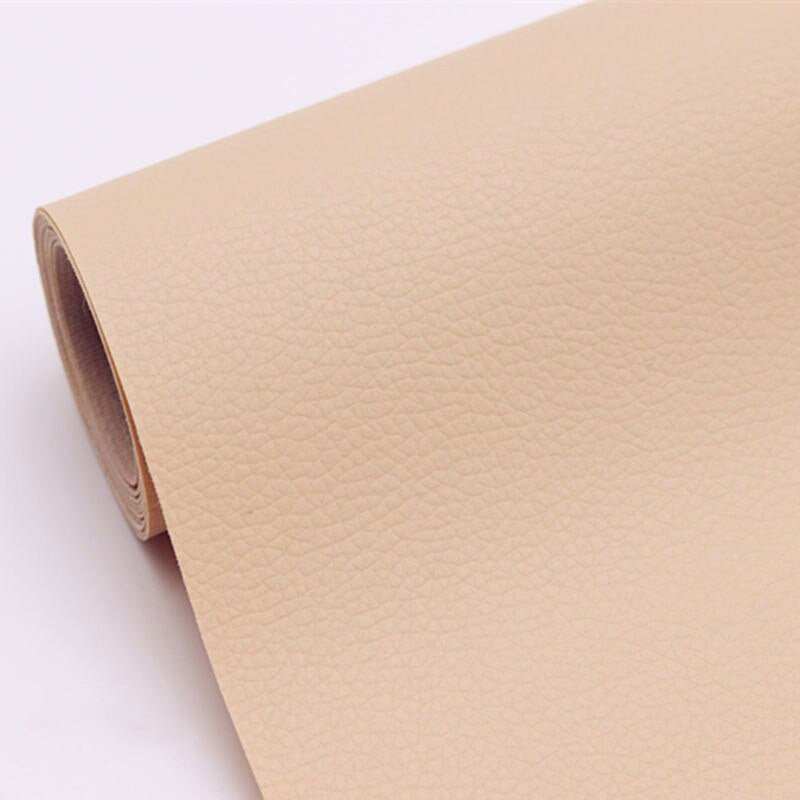 Scratch protector leather patch applied to office chair armrest