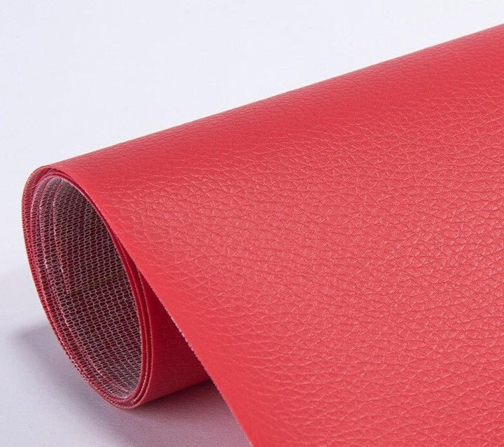 Brown self-adhesive furniture repair patch showing texture and thickness
