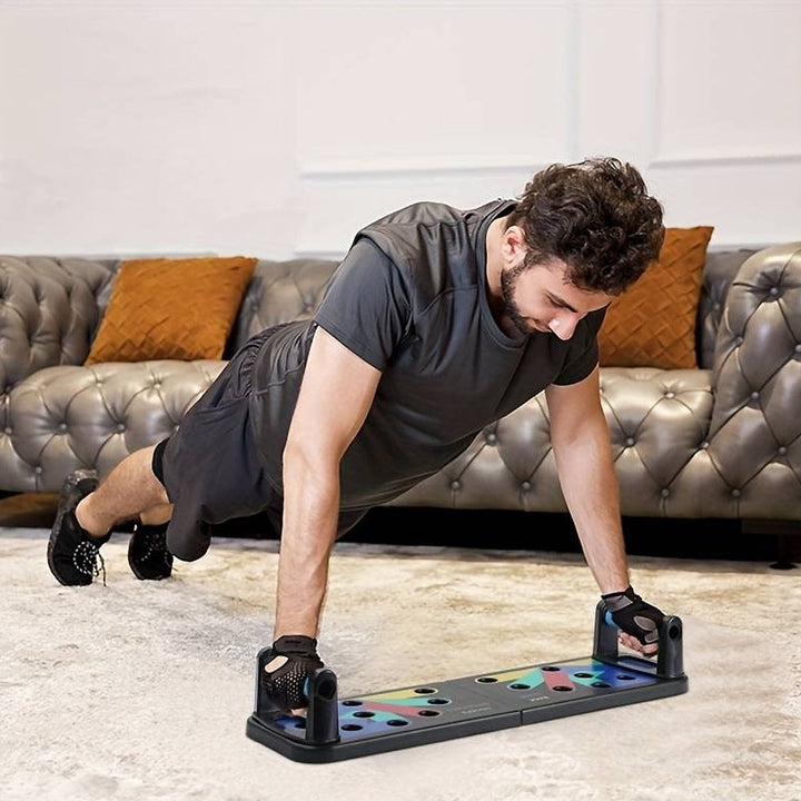 Man working out with a push up board on a living room rug