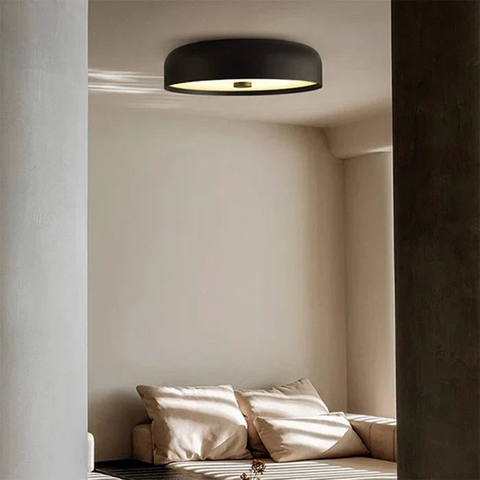 Living room light glowing softly, highlighting contemporary minimalist furniture.