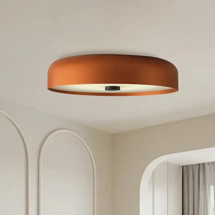 Low angle shot of the modern lighting fixture mounted flush against a white ceiling.