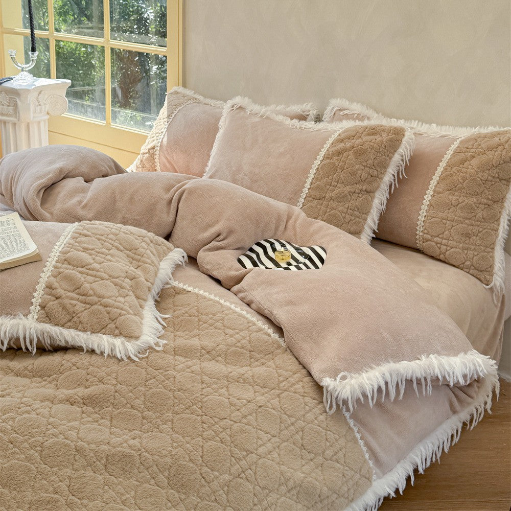 Decorative throw pillows with fringe detail enhancing modern bedroom decor